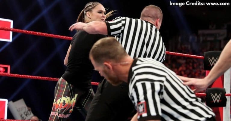 Ronda and husband Travis Browne assault Dana Brooke and WWE Officials