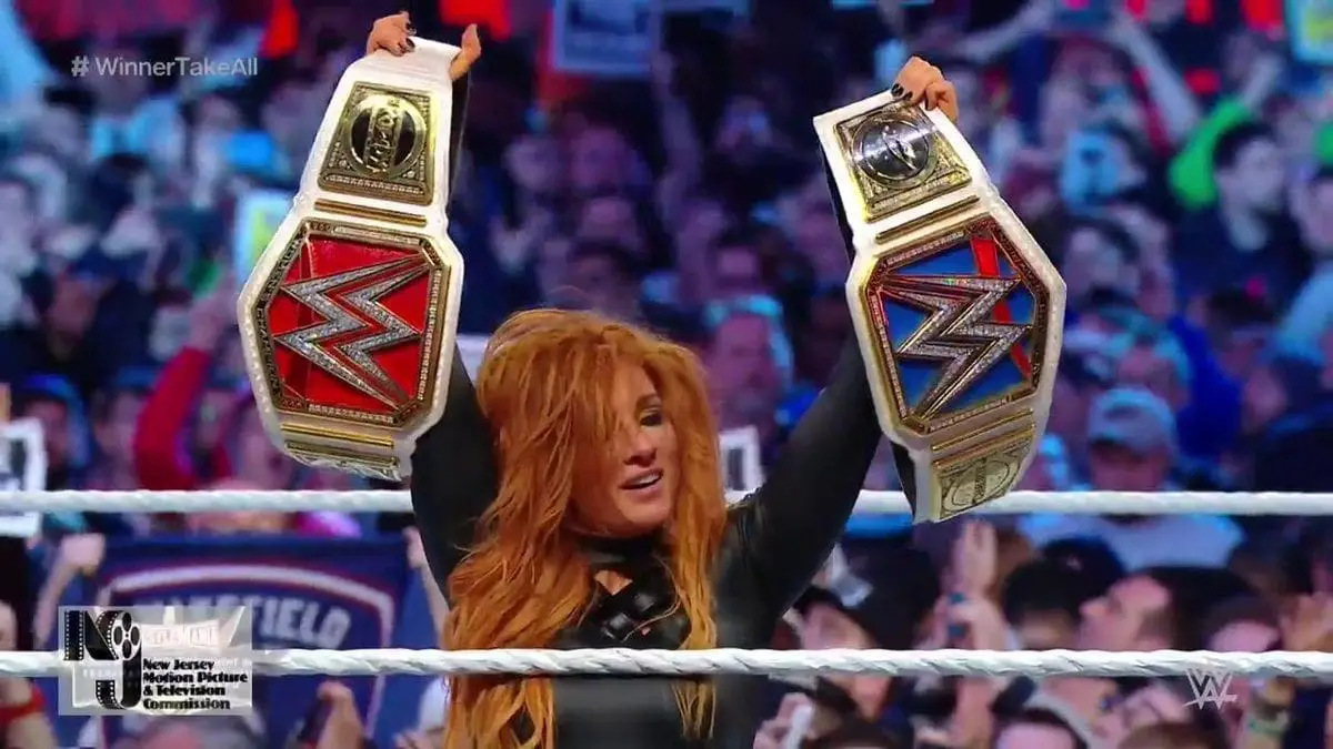 Becky Lynch became the first Women's Double Champion at WrestleMania 35, becky lynch wrestlemania 35, becky lynch raw & smackdown champion both