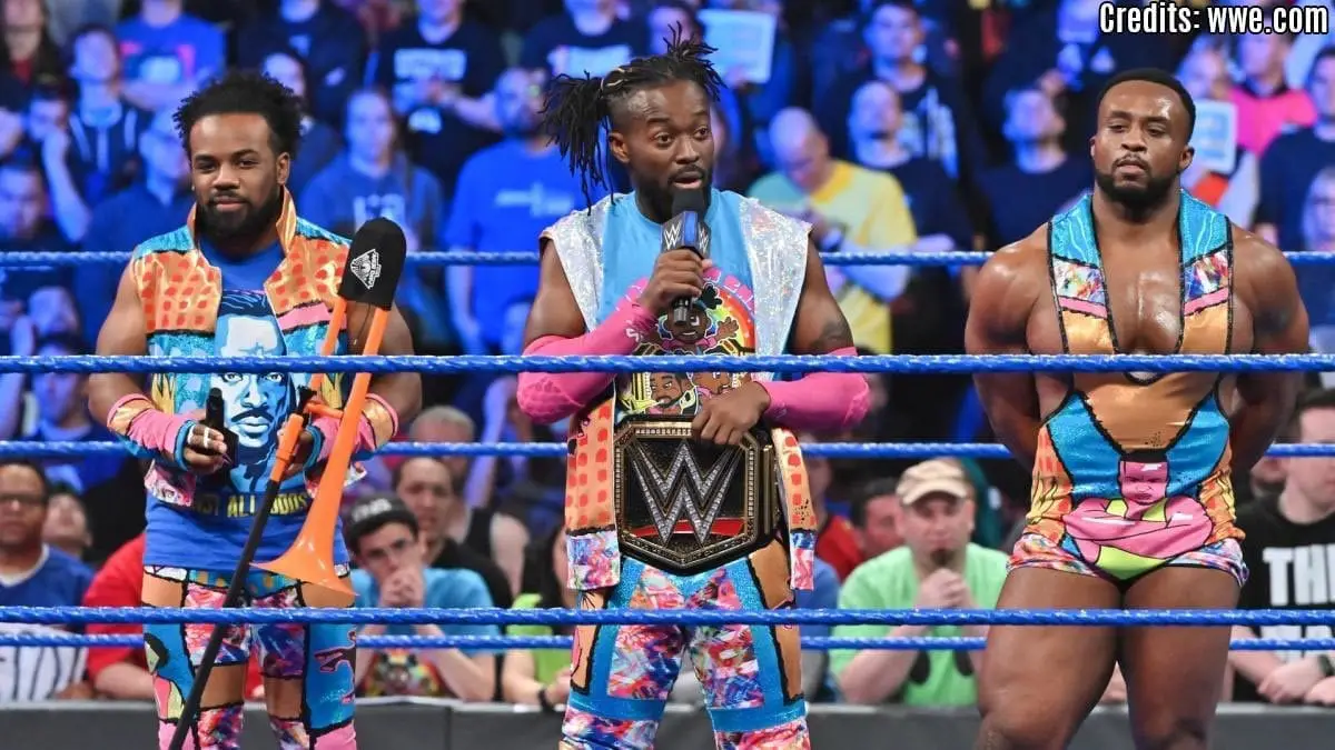 Kofi and New Day with WWE championship