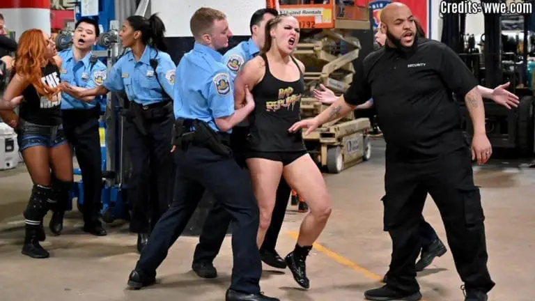 Ronda, Becky and Charlotte Arrested on RAW after a brawl