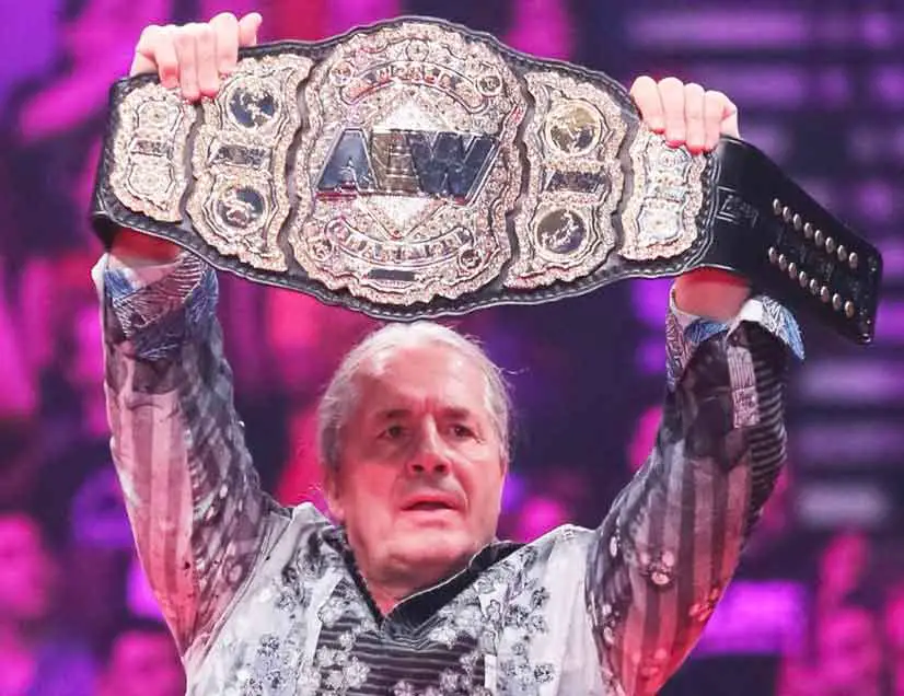 Bret Hart Unveils AEW World Title, Breat Hart with AEW World Title